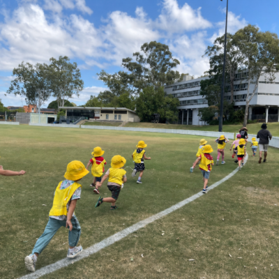 Regular Oval Play Excursion - Kindy children having fun on the oval
